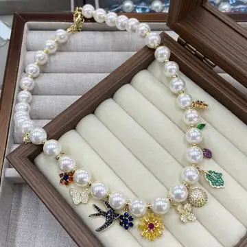 Pearl-Effect Charm Necklace — view 4
